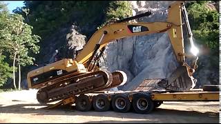 SUBIENDO UNA EXCAVADORA 330 CAT CAMA BAJA [upl. by Ellard705]