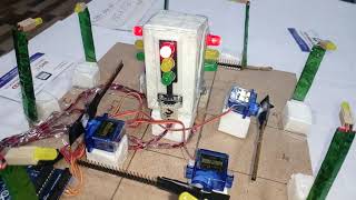 Smart Traffic Light Control System with Automatic Speed Breaker  Barrier [upl. by Assirk155]