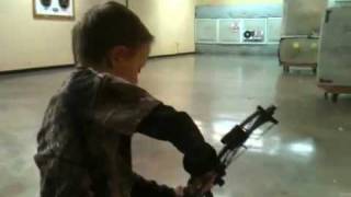 5yr old shooting balloons with a compound bow [upl. by Ytoc952]