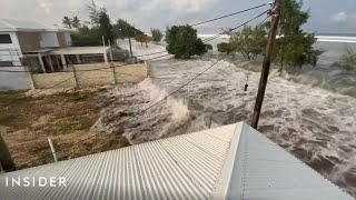 Watch Tsunami Hit Tongas Coast After Underwater Volcano Erupts [upl. by Angelia158]