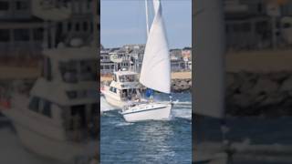 Sailboat Sets Sail As It Heads Through The Choppy Inlet [upl. by Yelrihs]