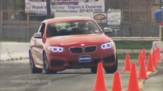 MotorWeek  Road Test 2014 BMW M235i [upl. by Eednil]