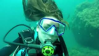 Female Diver is Diving with Neoprene Wetsuit in Sea [upl. by Nagap]