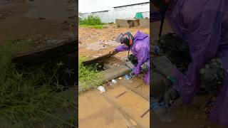 From Clogged to Clear Unclogging Storm Drains to Fight Street Floods shorts video viralvideo [upl. by Enyamert]