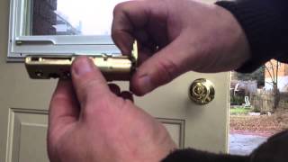 Howto replace an external doorknob and deadbolt [upl. by Ahsaret]