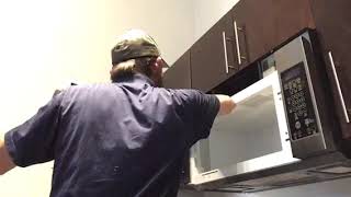 How to Replace a Whirlpool Microwave Door [upl. by Drarej]