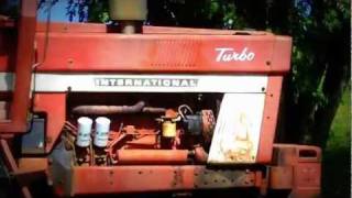 Farmall 966 with Vermeer Rake [upl. by Daryle825]