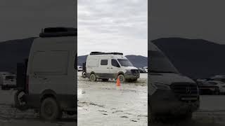 Burning Man 2023  Vehicles push through mud at the soggy festival in Nevada desert [upl. by Aldrich]