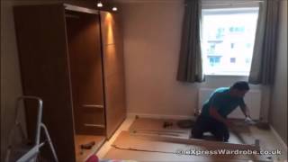 IKEA Pax Sliding Door Wardrobe Assembly  Time Lapse 2014 [upl. by Ylirama]