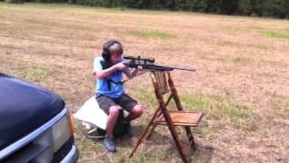 Shooting a 243 savage axis youth 9 year old 2 [upl. by Nalniuq]