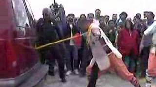 Shaolin Monk Shi De Shan Pushes Van with Spear [upl. by Romanas639]