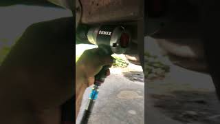 Sunex SX4350 Air impact wrench versus Ford E250 radius arm nut [upl. by Emmye]