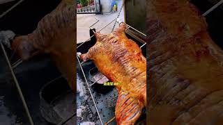 Outdoor freshly roasted whole lamb specialties crispy on the outside and tender on the inside [upl. by Iborian]