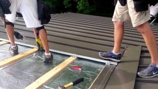 Standing seam roof installation [upl. by Kaylyn]