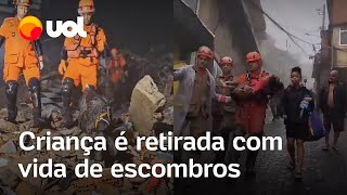 Petrópolis menina de 4 anos é retirada com vida de escombros após pai usar corpo para protegêla [upl. by Ellenid]