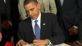 Obama Signs Historic Health Reform Into Law [upl. by Netsrek465]