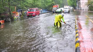 Unclogging Drains to Drain Floods Draining Streets After Heavy Rains [upl. by Harolda]