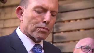 PM Tony Abbott eating a raw onion with skin is not common but Onions Australia celebrate [upl. by Medovich]