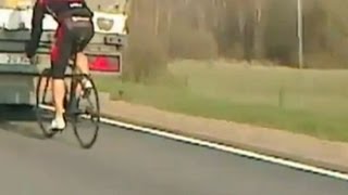 Cyclist speeds at 90kph on motorway after getting caught in the slipstream of a lorry [upl. by Ysiad784]