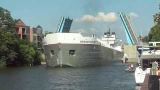 Manitowoc Great Lakes Freighter Navigates Narrow Channel In Manistee Michigan [upl. by Mariann]