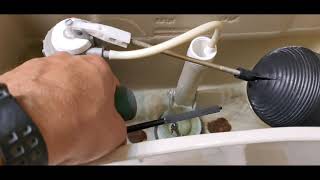 How to Adjust the Ballcock Valve and Water Level in a Toilet Tank [upl. by Incrocci]