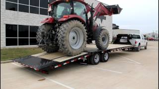 PJ Gooseneck Hydraulic Dovetail Loading a Case IH Maxxum 130  PJ Trailers [upl. by Aniloj]