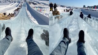 Woman Glides Down SLIDE OF ICE  Yakutsk City Ice Festival [upl. by Gabriellia160]