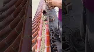 The cement mortar fixing process of red glazed tiles on the roof [upl. by Bjorn14]