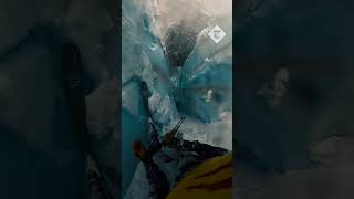 Skier falls down deep glacier cliff and narrowly avoids falling into the abyss [upl. by Anatak]