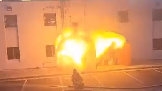 Fiery explosion erupts after firefighter opens door [upl. by Ahseekan52]