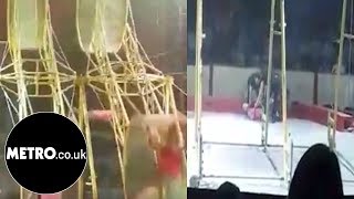 Circus performer falls out of 30ft spinning wheel  Metrocouk [upl. by Ynos]