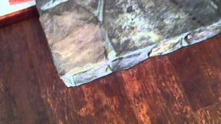 How to cut laminate flooring next to a stone fireplace [upl. by Ahsitniuq454]