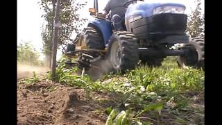 Weed Badger Model 4000 Tiller with the Super Sensor in an Orchard [upl. by Orsino338]