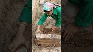 Building a stove with bricks and mudstraw mix [upl. by Nea]