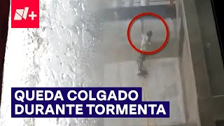 Trabajador quedó colgado en edificio de Lomas de Angelópolis durante tormenta  N [upl. by Reinnej]