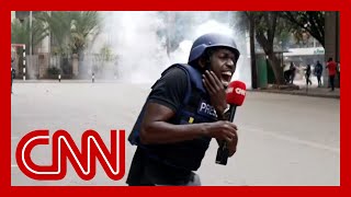 CNN reporter hit by fragment of tear gas canister while reporting on Kenya protests [upl. by Alfons991]