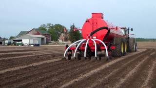 Slurry Tanker Injecting Manure with Case IH Tractor [upl. by Ahsiemaj]