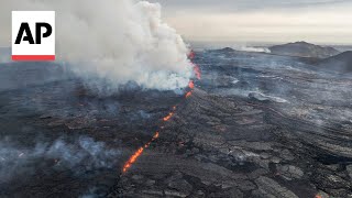 WATCH Drone footage shows Iceland volcano spewing red lava [upl. by Aileda]