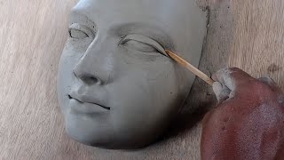 making a female face with water based clayhow to make a face with clay sculpting face in clay [upl. by Ynavoj138]