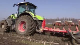 Ploughing 2014  CLAAS Axion 950 CMatic  KUHN VariMaster 152 [upl. by Tergram981]