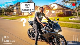 TEACHING LIFE WITH COREY HOW TO WHEELIE HIS ZX10R STREET BIKE   BRAAP VLOGS [upl. by Analat380]