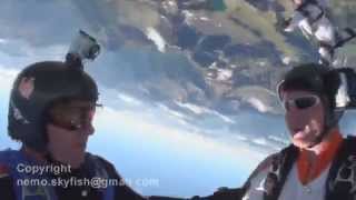 Skydivers near impact and landing on top of a mountain [upl. by Heurlin3]