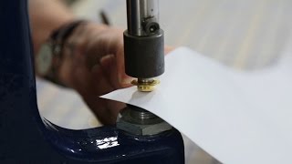 How to Install Grommets with a Hand Press  Product Assembly  Displays2go® [upl. by Akiaki]