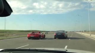 Mercedes CLS55 AMG vs Ferrari F430 Spider [upl. by Turk]