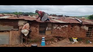 Hailstorm Gets Gogo Fixing Her Roof [upl. by Ntsud]