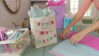 Giftology How to Fill a Gift Bag with Tissue [upl. by Drucy849]