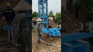 Drilling raw concrete piles  building classic houses [upl. by Hsirrap]