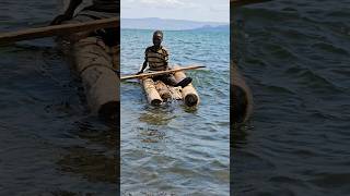 Kids using Logs Of Wood as Boat For Fishing In Lake Turkana shortsfeed africanculture africa [upl. by Roze677]