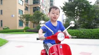 Vespa PX150 12v Kids Battery Electric Electric Rideon ScooterMotorbike [upl. by Aremahs15]