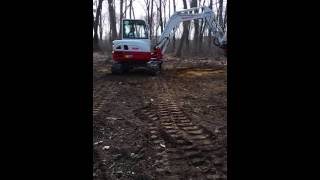 Rototilt test run on a new Takeuchi TB260 [upl. by Ecirtnahc]